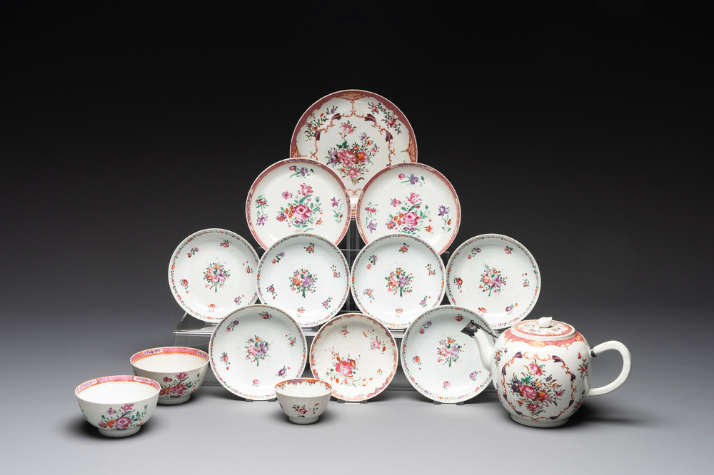 A Chinese famille rose 'Lowestoft' teapot, a plate, three cups and nine saucers, Qianlong