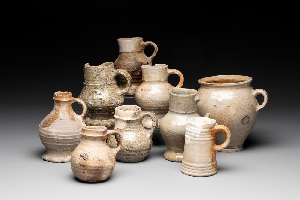 A collection of 9 German stoneware jugs, 16th C. and later