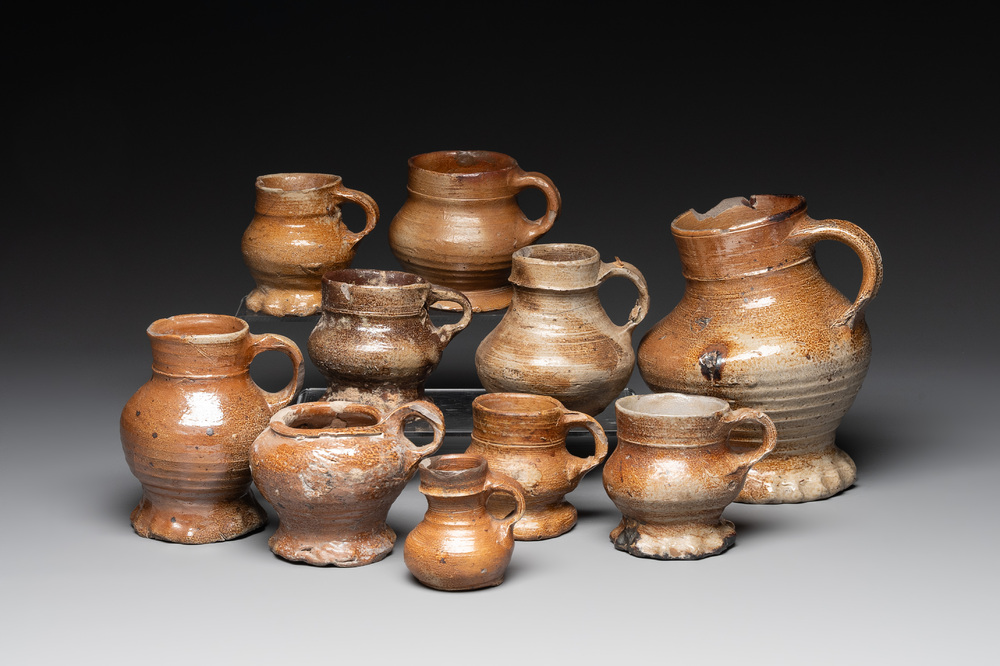 A collection of 10 German stoneware mugs, 14/16th C.