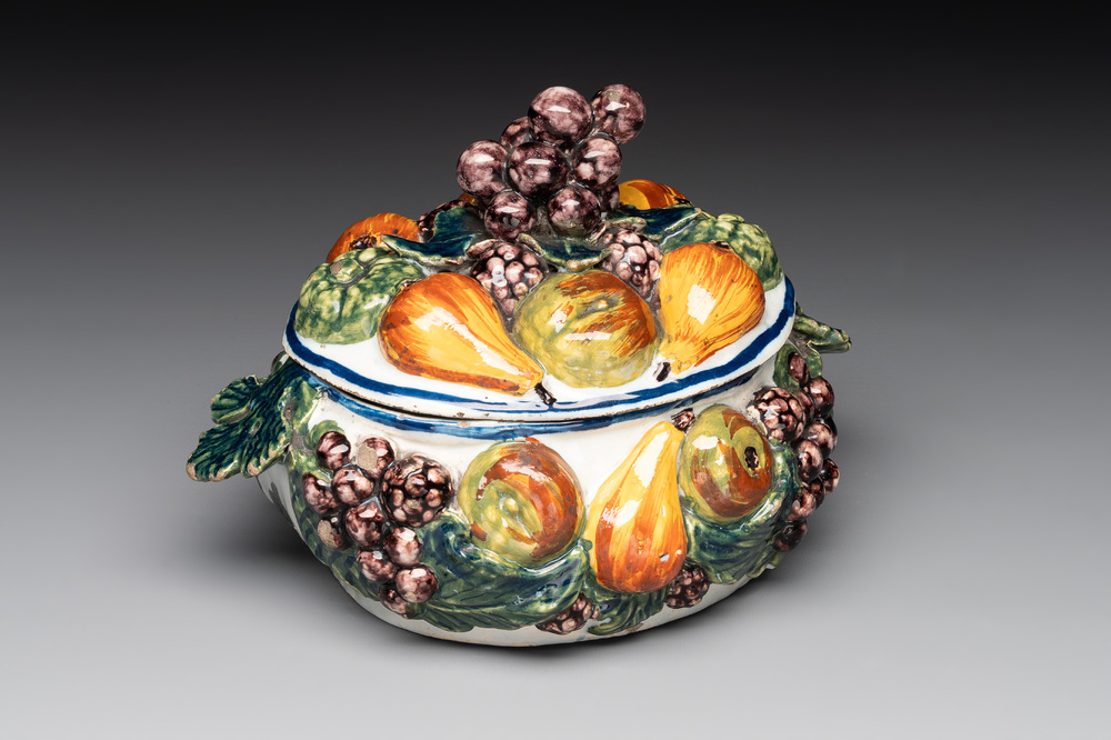 A polychrome Dutch Delft butter tub in the shape of various fruits, 18th C.