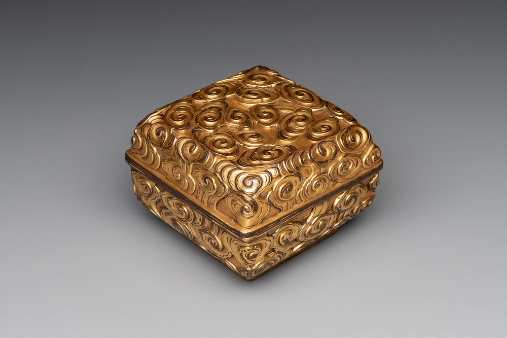 A Chinese square gilt bronze ink box and cover (印泥盒), Xuande mark and possibly of the period
