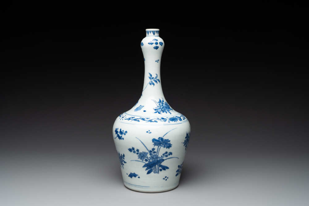 A Chinese blue and white bottle vase with floral sprigs, Transitional period