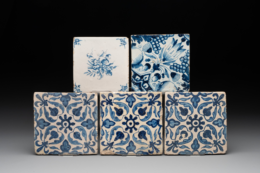 Five blue and white Dutch Delft tiles with floral design, 17th C.