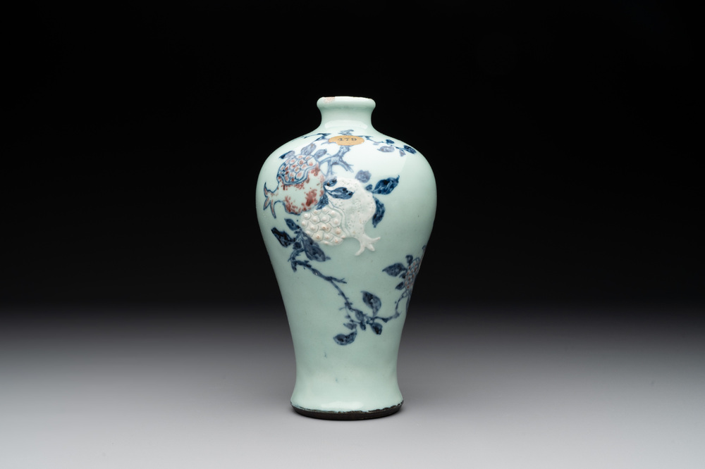 A rare Chinese blue, white and iron-red celadon-ground 'pomegranate' 'meiping' vase, Qianlong mark and of the period