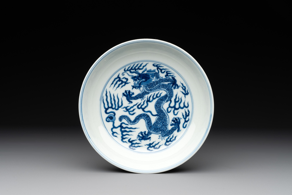 An imperial Chinese blue and white 'dragon' plate, Qianlong mark and of the period
