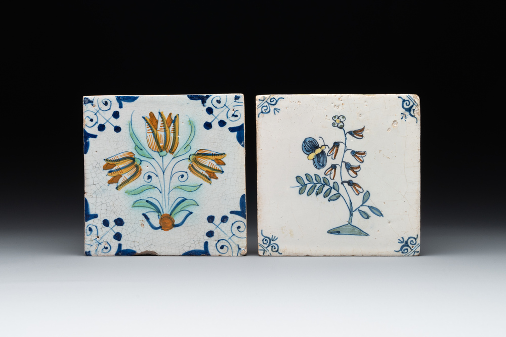 Two polychrome Dutch Delft 'flower' and 'butterfly and flower' tiles, 17th C.