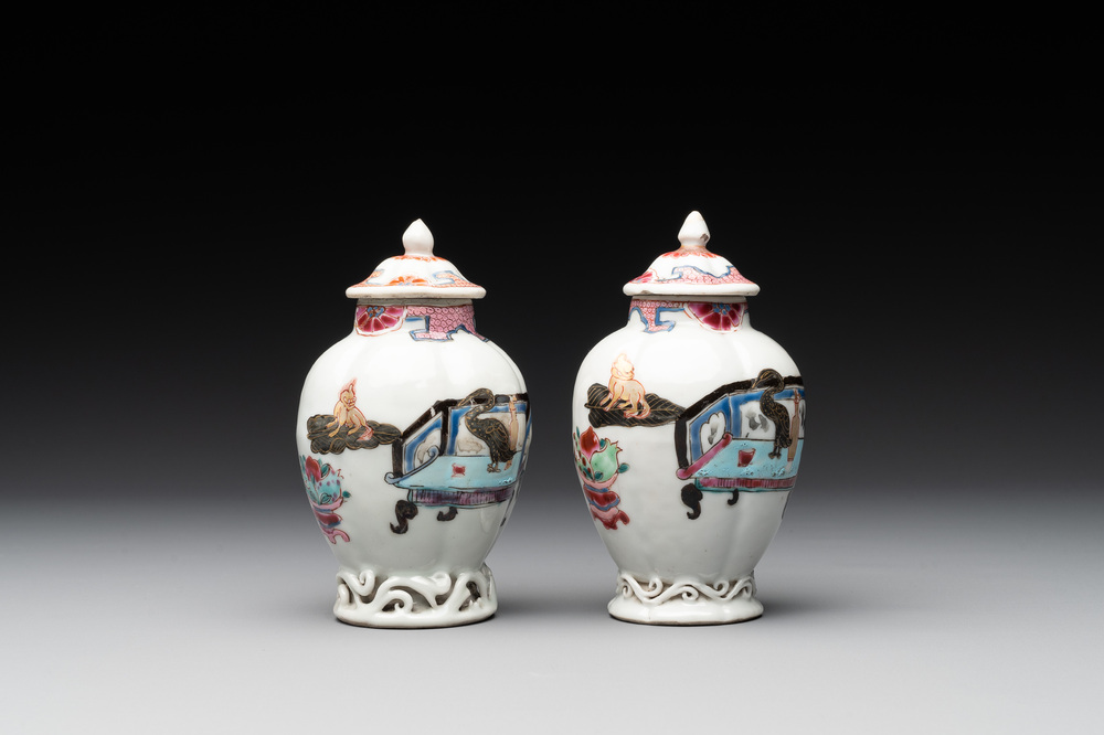 A pair of Chinese famille rose 'antiquities' tea caddies and covers, Yongzheng/Qianlong