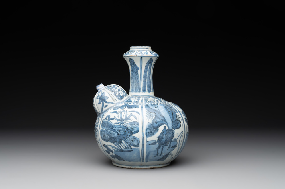 A Chinese blue and white 'kraak' porcelain 'deer and rooster' kendi, Wanli