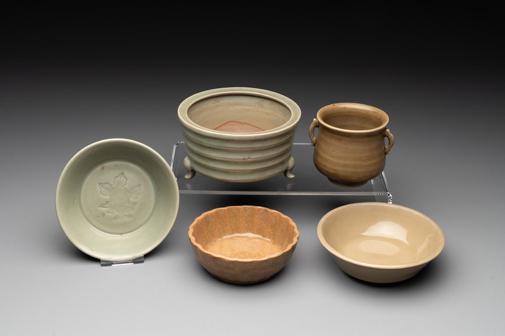 Two Chinese Longquan celadon incense burners and three saucers, Yuan/Ming