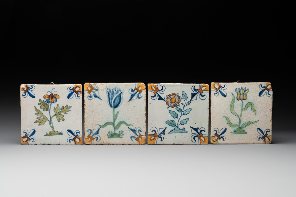 Four polychrome Dutch Delft 'flower' tiles, 17th C.