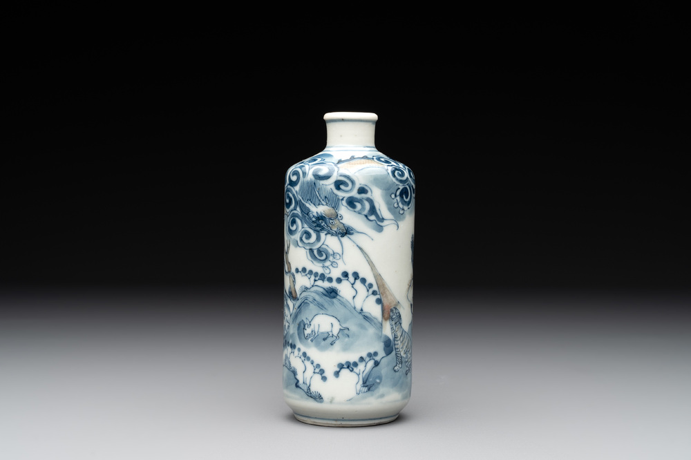A large Chinese blue, white and copper-red 'zodiac' snuff bottle, squirrel mark, 19th C.