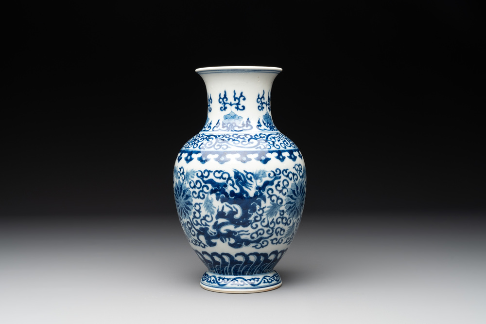A Chinese blue and white 'phoenix and flower scroll' vase, Qianlong mark, 19th C.