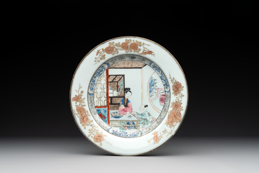 A Chinese famille rose 'lady and boy' plate, Yongzheng/Qianlong