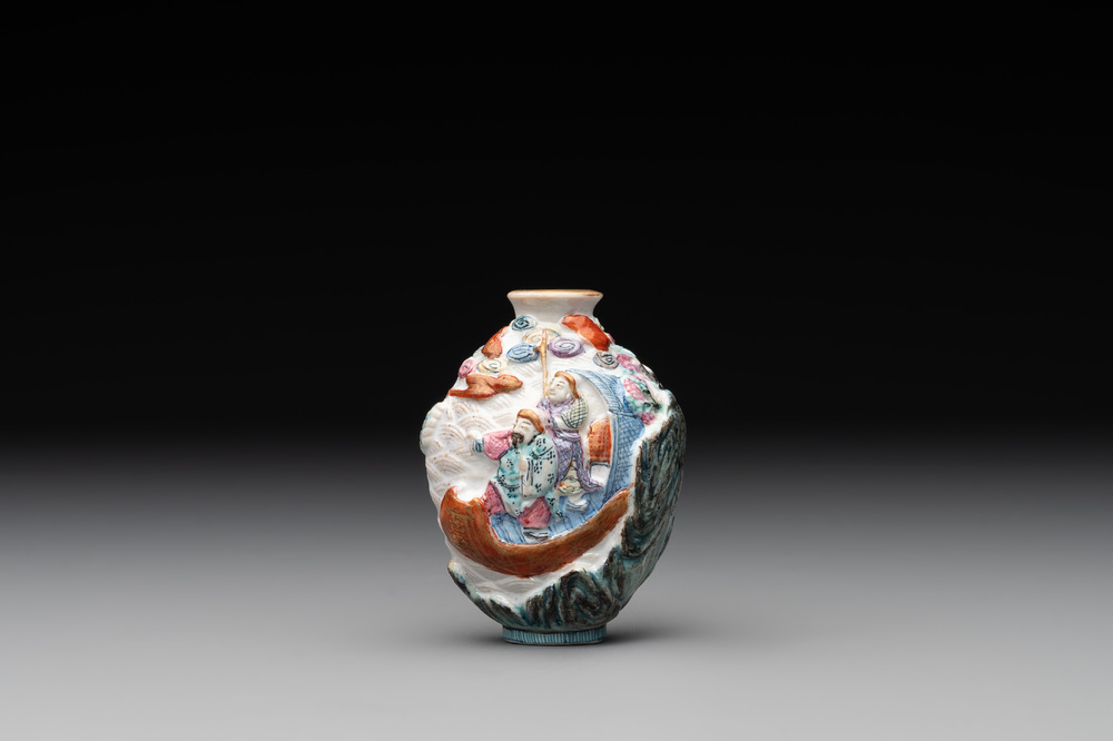 A Chinese famille rose molded 'capsized boat' snuff bottle, Qianlong mark, 19th C.