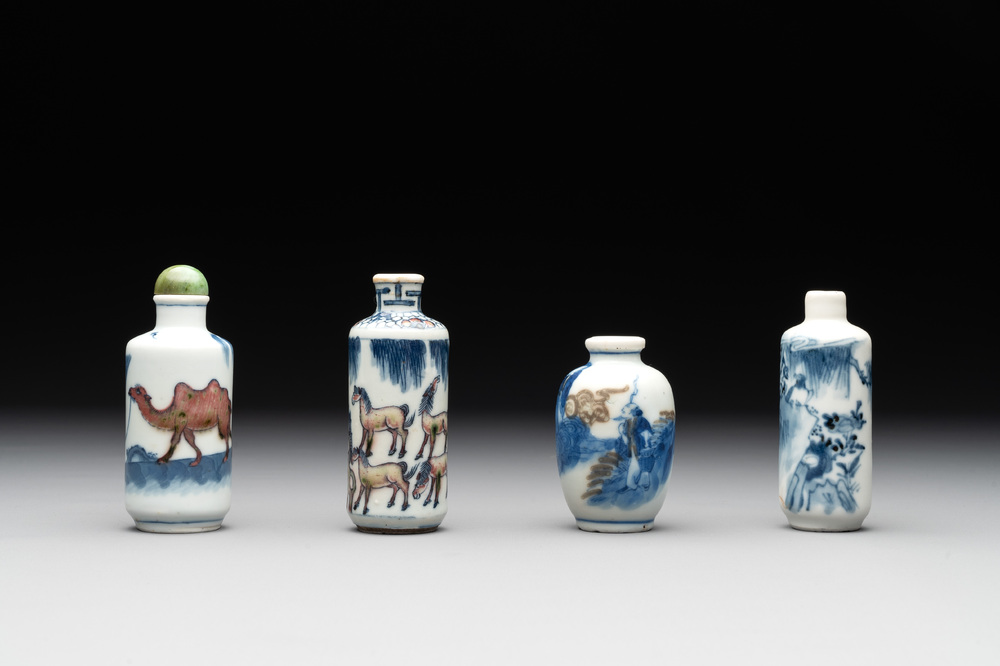 Four Chinese blue, white and copper-red snuff bottles, Yongzheng and Qianlong mark, 19th C.
