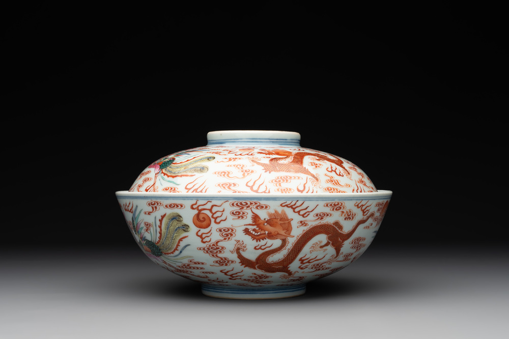 A Chinese famille rose 'dragon and phoenix' bowl and cover, Jiaqing mark and of the period