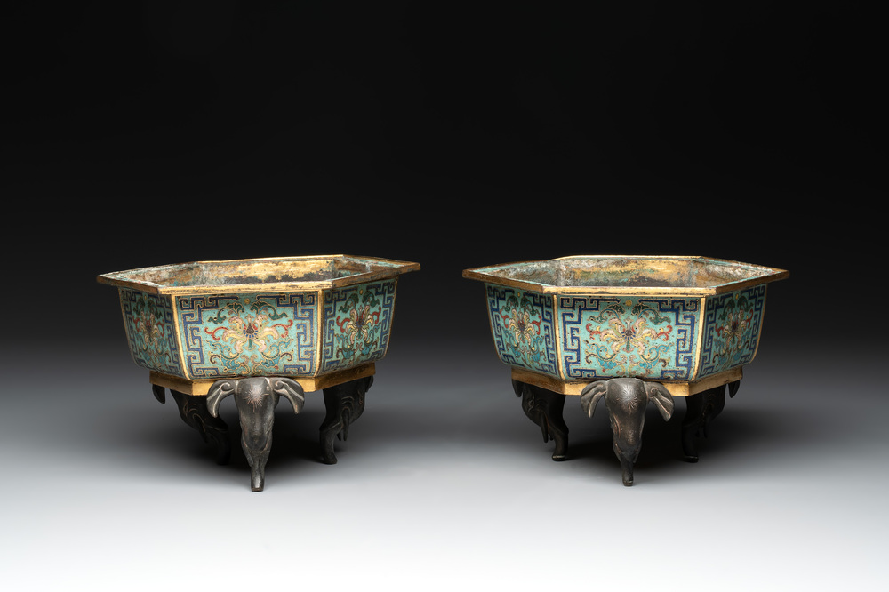 A pair of Chinese cloisonn&eacute; 'lotus and elephant' jardini&egrave;res, 18/19th C.