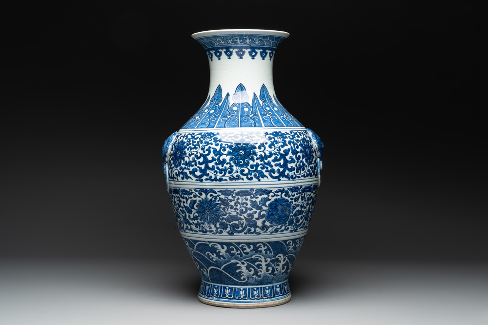 A large Chinese blue and white 'flower scroll' vase, Qianlong mark, 19th C.
