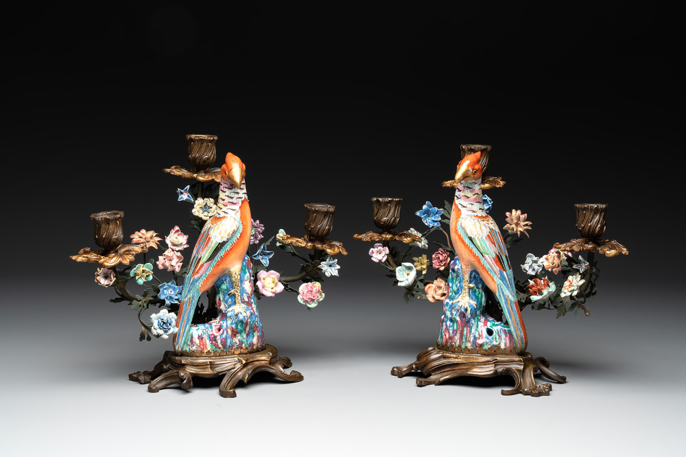 A pair of candle holders mounted with Chinese famille rose models of pheasants, Qianlong