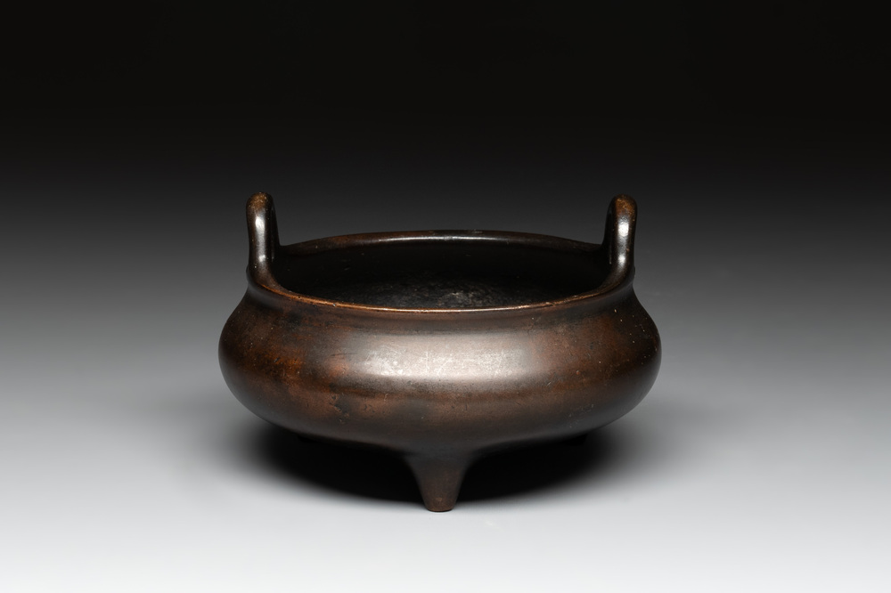 A Chinese bronze tripod censer, Xuande mark, 17/18th C.