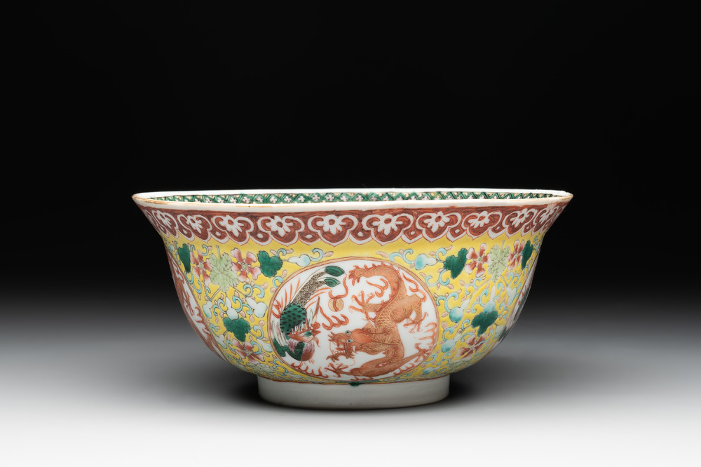 A Chinese famille rose yellow-ground 'dragon and phoenix' bowl, artemisia leaf mark, Guangxu