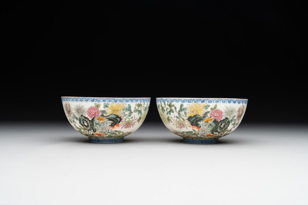 A pair of Chinese famille rose eggshell bowls with floral design, Qianlong mark, 20th C.