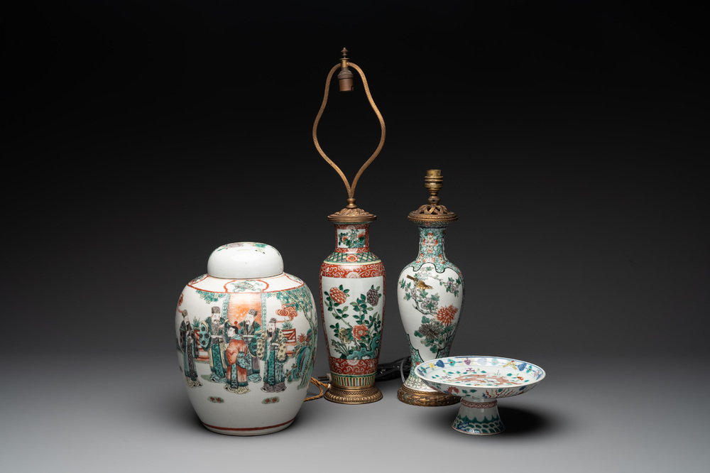 A Chinese famille verte covered jar, two vases mounted as lamps and a tazza, 19th C.