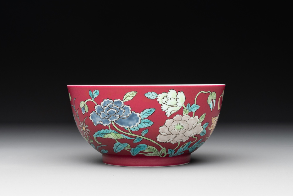 A Chinese famille rose ruby-ground 'peony' bowl, Yongzheng mark, 19/20th C.