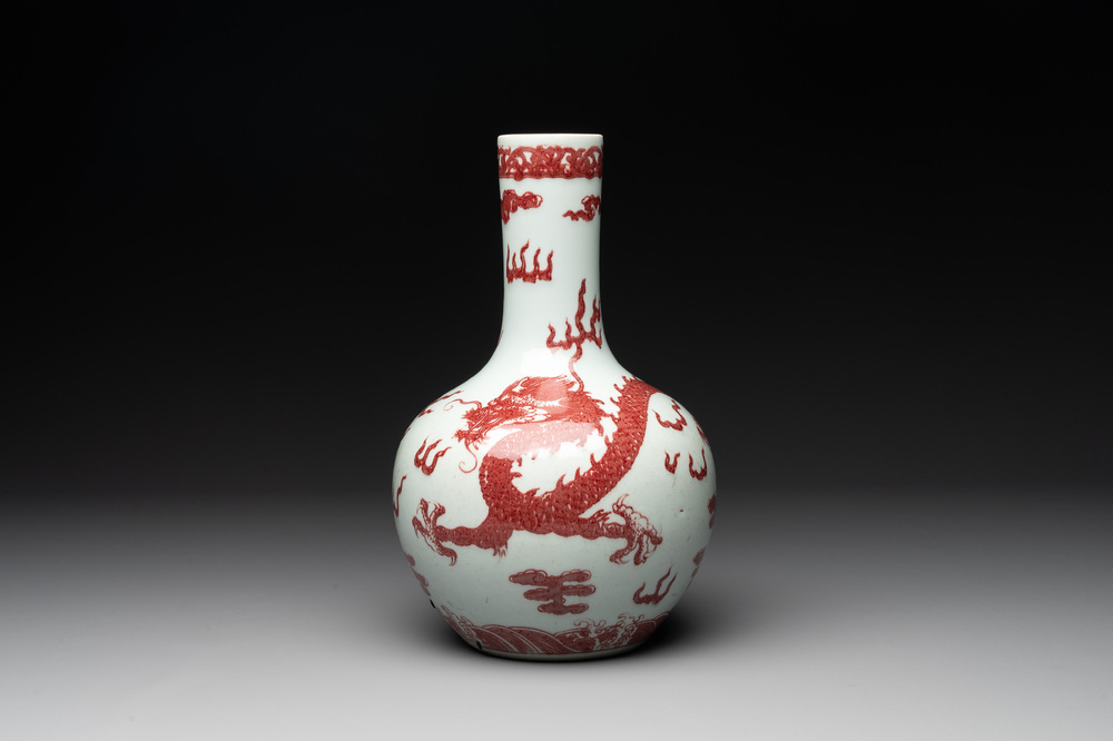 A Chinese copper-red and white 'dragon' bottle vase, 18th C.