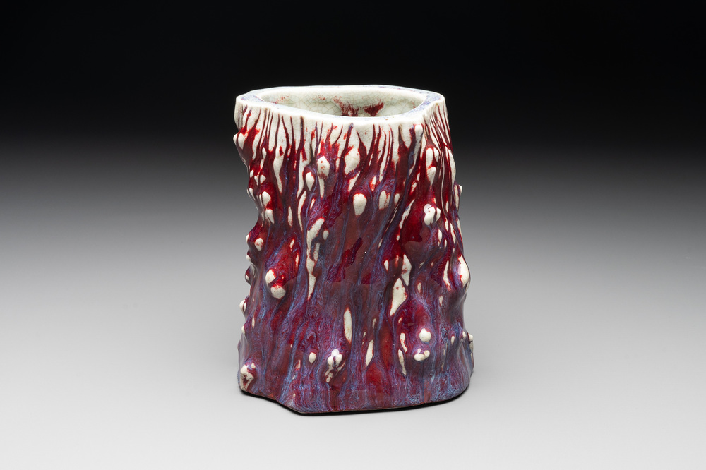 A Chinese flamb&eacute;-glazed trunk-shaped brush pot, 19th C.