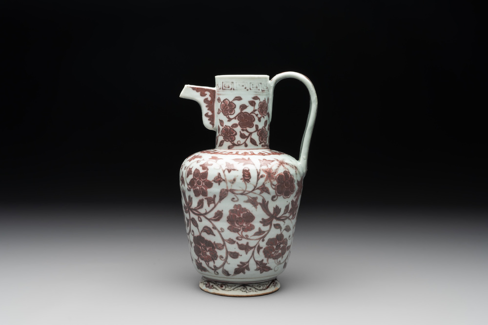 A Chinese copper-red and white 'flower scroll' ewer, Ming or later