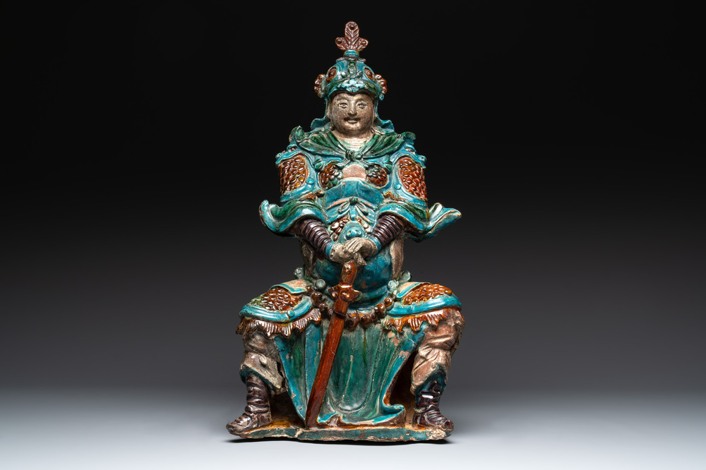 An impressive and fine Chinese sancai-glazed biscuit Guandi, Ming, 17th C.