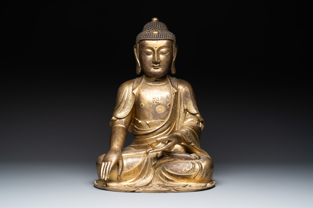 An impressive and large Chinese gilt bronze Buddha, Ming, 16th C.
