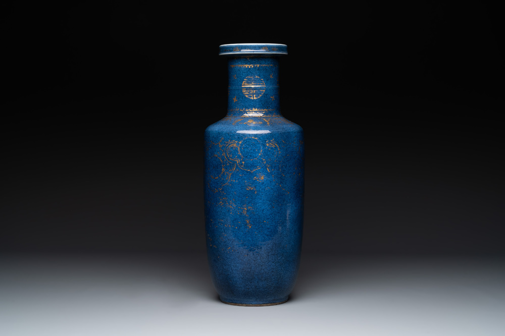 A Chinese gilt-decorated powder blue 'dragon and phoenix' rouleau vase, Kangxi