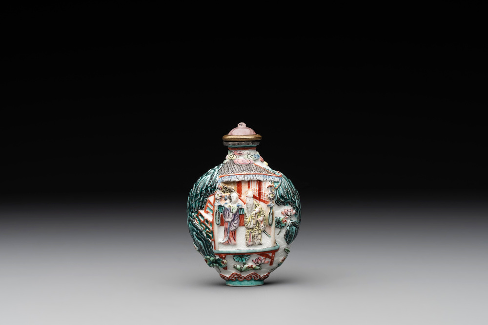 A Chinese famille rose relief-molded snuff bottle with an animated river landscape, Jiaqing mark and of the period