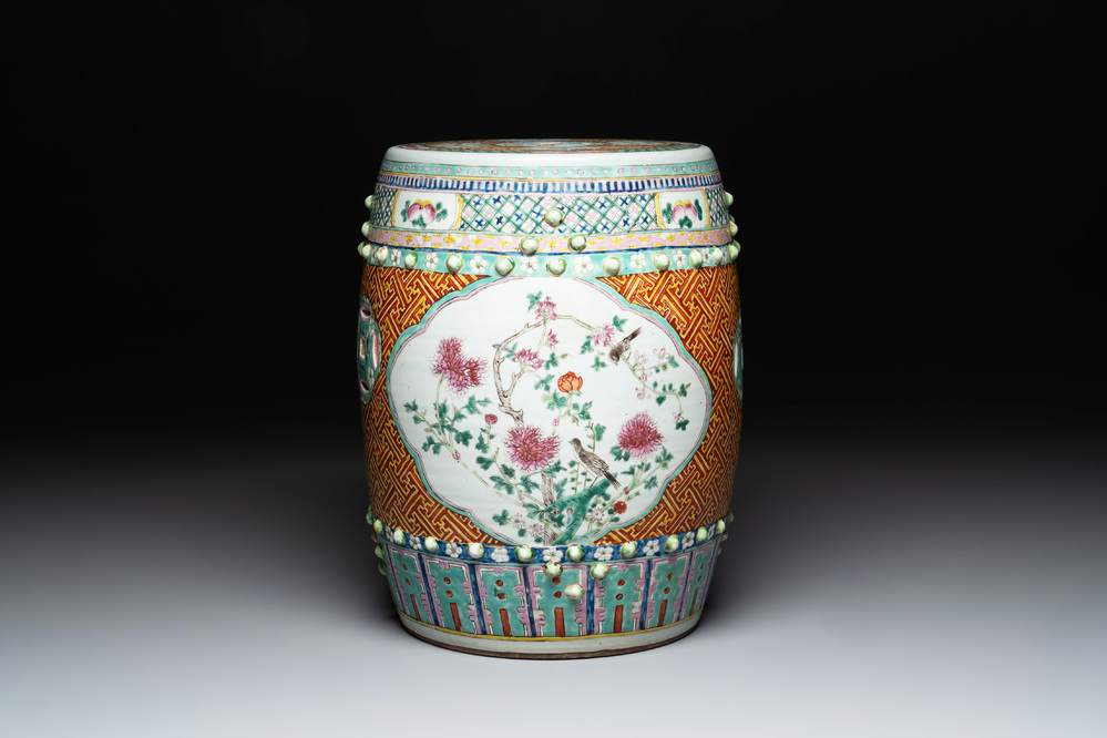 A Chinese famille rose garden seat with birds among flowering branches, 19th C.