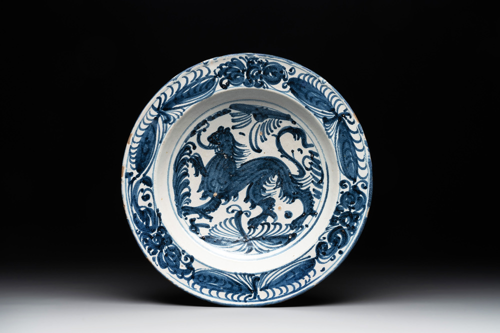 A rare Spanish blue and white pottery 'lion' dish from the 'mariposas' series, Puente del Arzobispo, Toledo, 16th C.