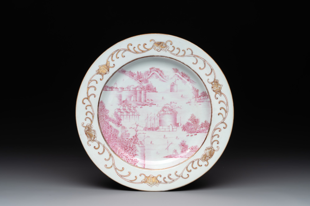 A Chinese puce-enamelled and gilt-decorated 'harbour scene' plate, Qianlong