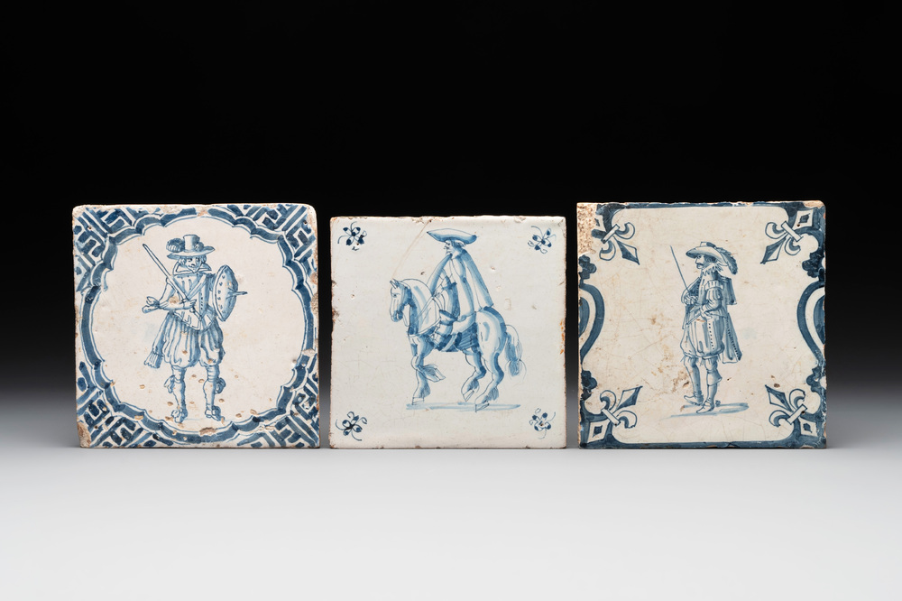 Three fine blue and white Dutch Delft 'soldier' tiles, 17th C.