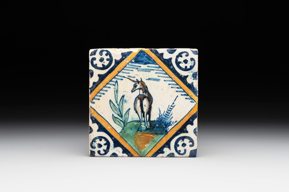 A polychrome Dutch Delft maiolica 'diamond' 'unicorn' tile, late 16th C.