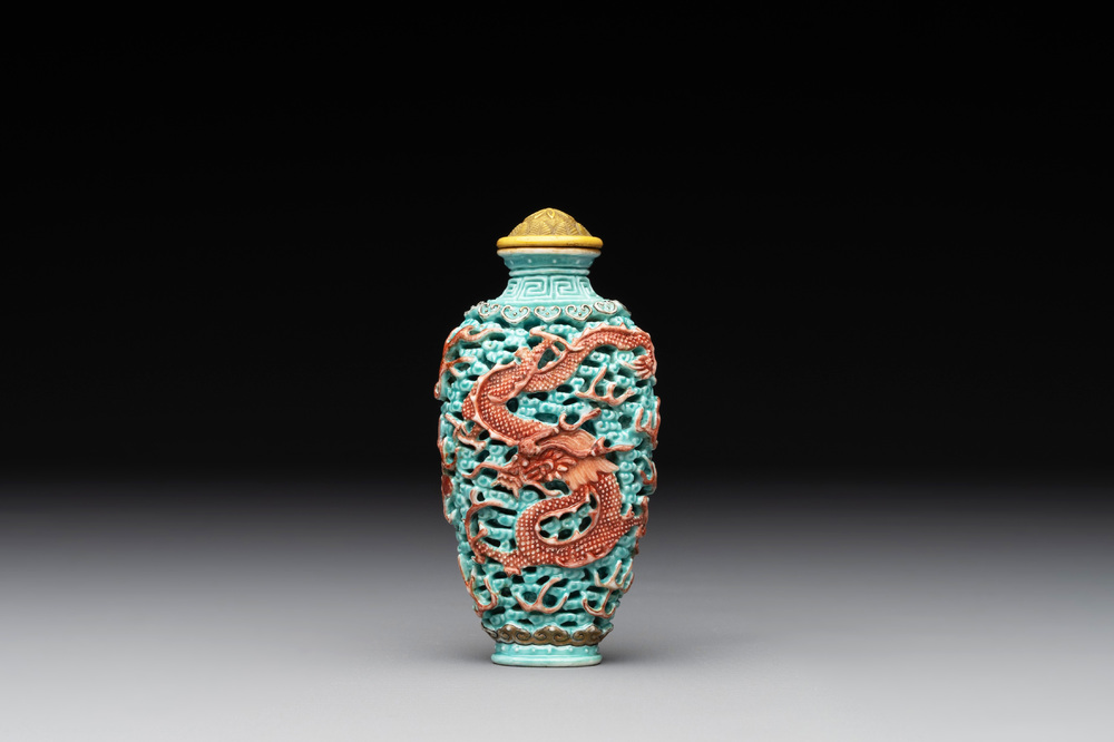 A Chinese moulded turquoise-ground famille rose 'dragon and phoenix' snuff bottle, 19th C.