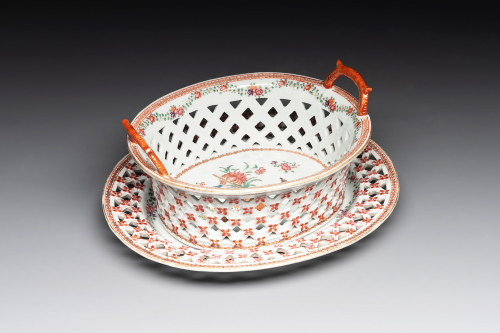 A Chinese openworked famille rose 'antiquities' basket and stand, Qianlong