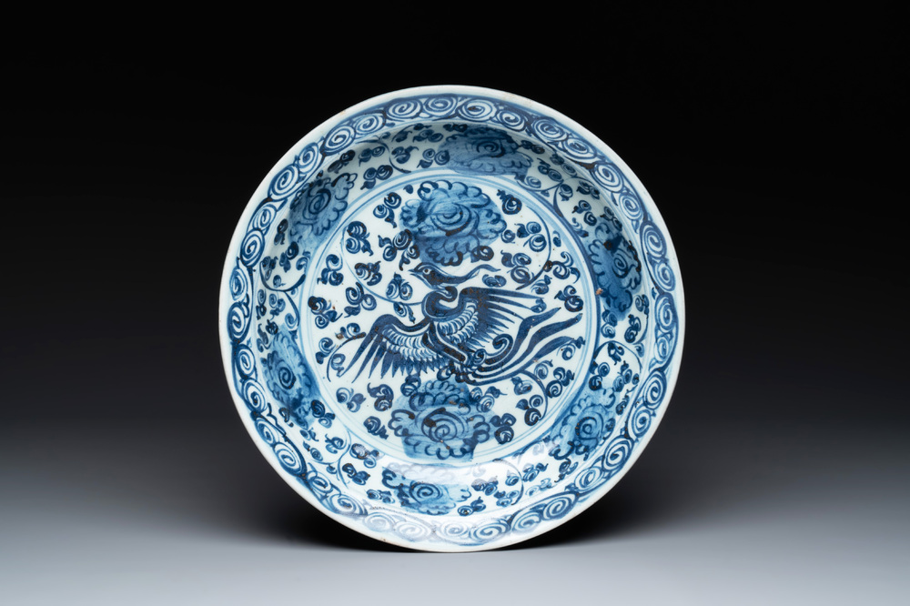 A Chinese blue and white 'phoenix and peonies' dish, Hongzhi/Zhengde