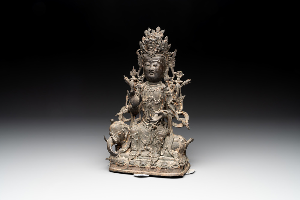 A Chinese bronze Bodhisattva seated on an elephant, Ming