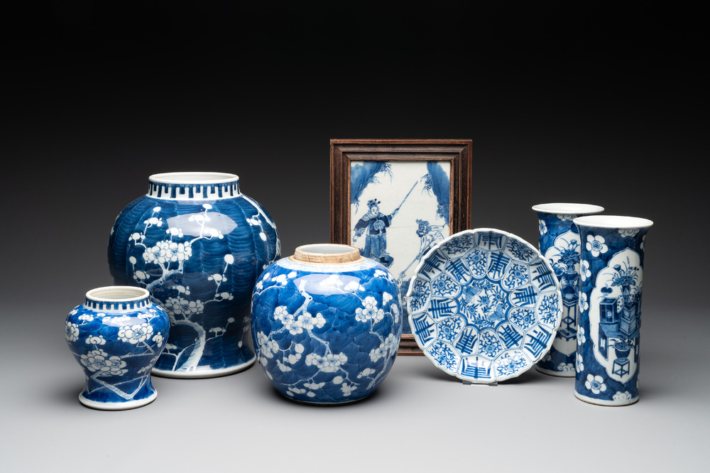 A pair of Chinese blue and white 'gu' vases, three jars, a plate and a plaque, Kangxi mark, 19th C.