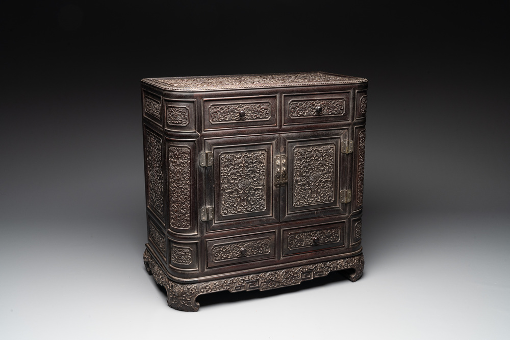 A Chinese zitan wood 'duo bao ge' cabinet of curiosities with carved floral design, 19th C.