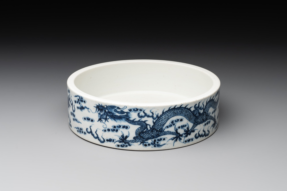 A Chinese blue and white 'dragon and phoenix' brush washer, Yongzheng mark, 19th C.
