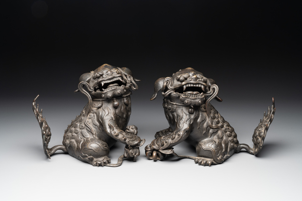 A pair of fine Chinese bronze Buddhist lions, 17/18th C.