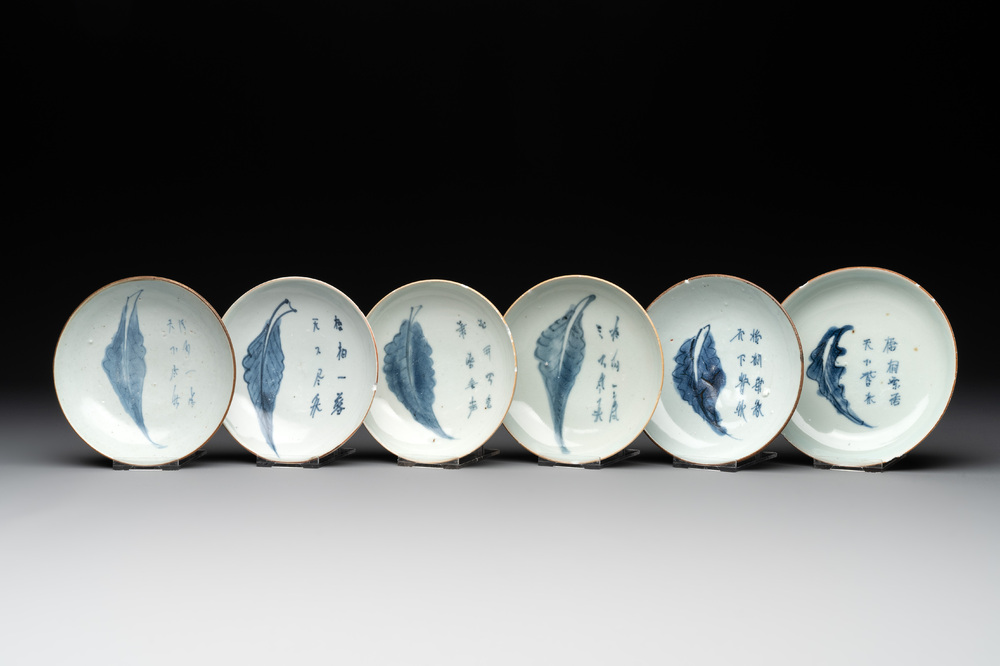 Six Chinese blue and white 'leaf and poem' saucers, Shunzhi