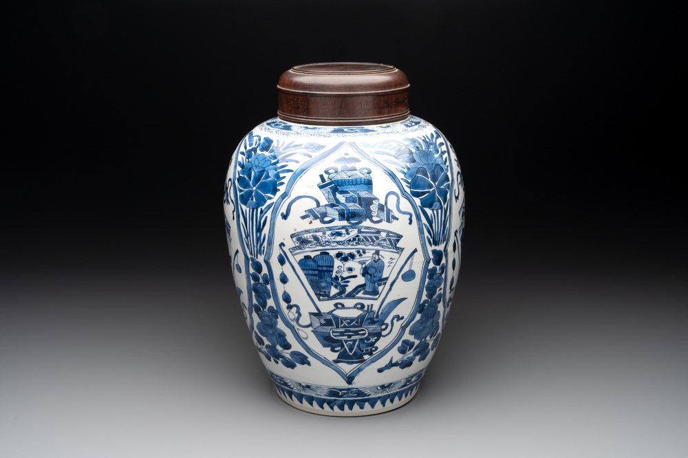 A Chinese blue and white jar and wooden cover, Kangxi